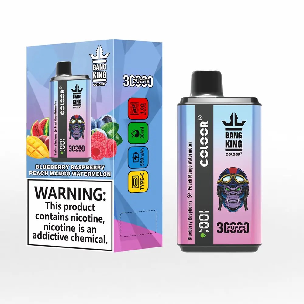 A colourful Bang King disposable vape and its matching box showing a gradient purple‑pink pod with a black mouthpiece and monkey-with-goggles logo, flavour icons for blueberry, raspberry, peach mango and watermelon, '3000' puffs branding and a prominent nicotine warning label on the box.