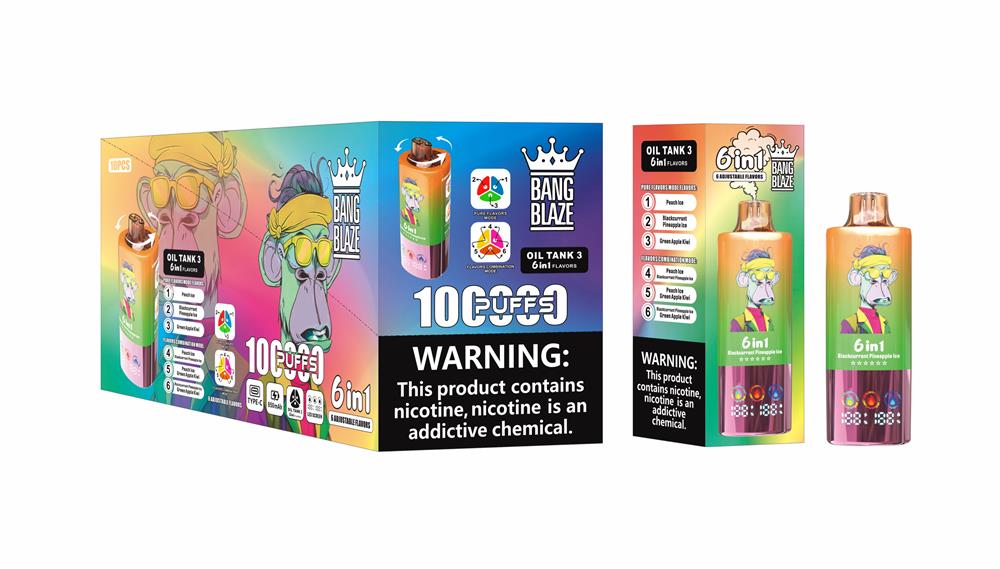 Colourful product shot of Bang Blaze Oil Tank 3 disposable vaping devices and packaging featuring a cartoon monkey graphic, two gradient-coloured vape pens, a box marked '6in1' and '10 PUFFS', and a prominent nicotine warning label.