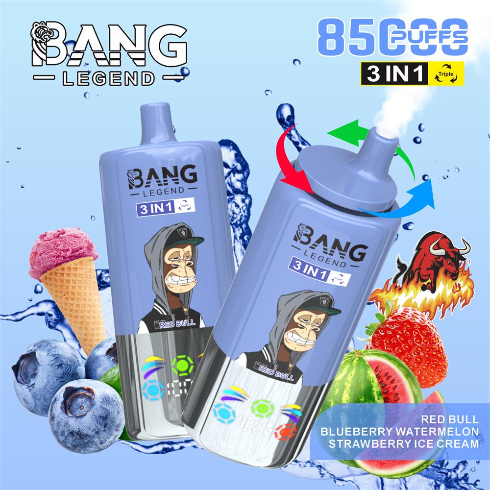 Two lavender-blue disposable vape devices branded BANG LEGEND and labelled 3 IN 1, set against a water-splash background with blueberries, a strawberry, watermelon slices, a strawberry ice cream cone and a flaming bull illustration, with on-image text indicating Red Bull, blueberry watermelon and strawberry ice cream flavours and 8500 puffs.