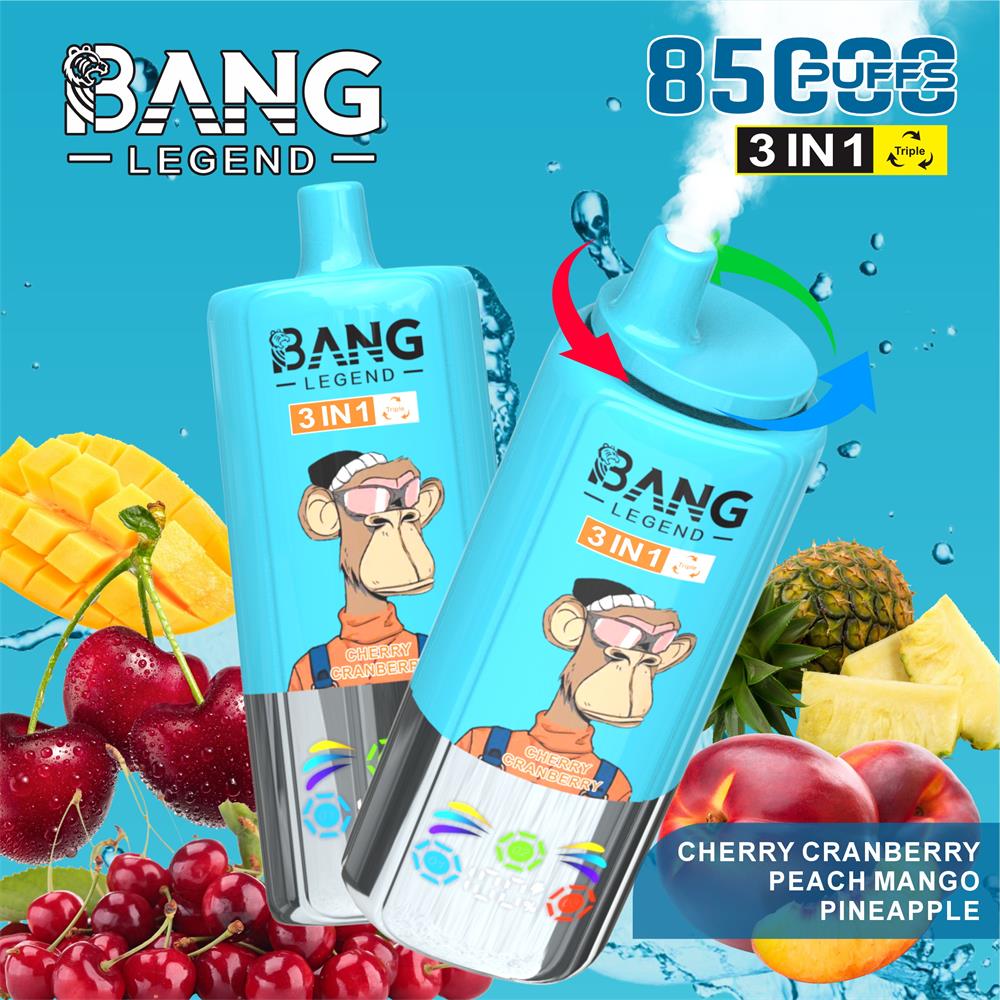Two turquoise Bang Legend 3-in-1 vape devices bearing a cartoon ape logo set against a splashy blue background with cherries, mango, pineapple and peaches, labelled Cherry Cranberry Peach Mango Pineapple and promoted as 85,000 puffs.
