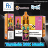 Orange Fumot Tornado 30K Music disposable vape with a vivid psychedelic skull graphic displayed centre, flanked by matching product boxes, brand logos, a nicotine addiction warning and the wadevape.com URL.
