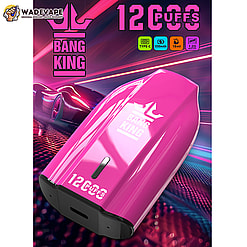 Glossy hot-pink disposable vape device with BANG KING logo and '12 CUFFS' printed on it, featuring a black mouthpiece and shown against a neon-lit racing background with a sports car and motion light streaks