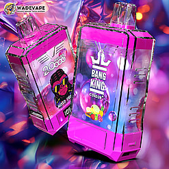 Two faceted bright-pink disposable vape devices with reflective surfaces—one showing a crown logo reading “Bang King” over fruit illustrations, the other labelled “20,000 puffs” and “Mixed Fruit”—set against a colourful bokeh background with a small WadeVape logo in the corner.