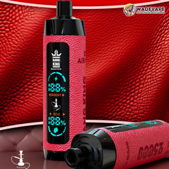 Two red, leather-textured Bang King vape devices on a matching red leather backdrop, one standing to show a cyan digital display with boost, eco and percentage icons and a small hookah symbol while the other lies horizontally with the WadeVape logo in the top right corner