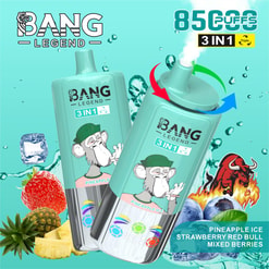 Two turquoise Bang Legend 3-in-1 disposable vape devices—one upright and one tilted emitting vapour—featuring a cartoon monkey logo and '8500 puffs' branding, surrounded by pineapple, strawberry, blueberries, ice cubes and a red bull graphic on an aqua, water-splashed background.
