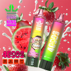 Two colourful Bang King disposable vape pens with gradient labels—one showing a cartoon grinning ape and the words Strawberry Watermelon—set against a pink background of strawberries, a watermelon slice and splashing milk with prominent puff-count branding.