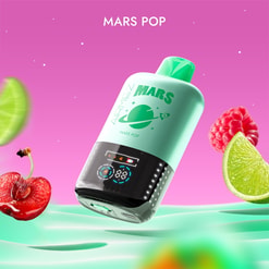 Mint-green Mars Pop handheld pod with a black LED-display base and planet logo floats against a pink gradient sky with tiny stars, framed by a lime wedge, a raspberry and a halved cherry
