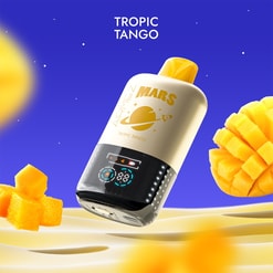 Floating cream-and-yellow bottle labelled MARS Tropic Tango with a yellow cap and a glossy black digital display, hovering over creamy sand dunes against a deep blue starry background with diced and sliced mango pieces nearby.