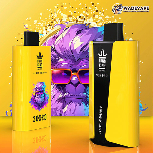Two bright yellow Bang King 30K Pro disposable vapes, one labelled Triple Berry and marked for 30K/30,000 puffs, displayed in front of a colourful backdrop featuring a purple stylised gorilla wearing pink sunglasses and paint-splash confetti.